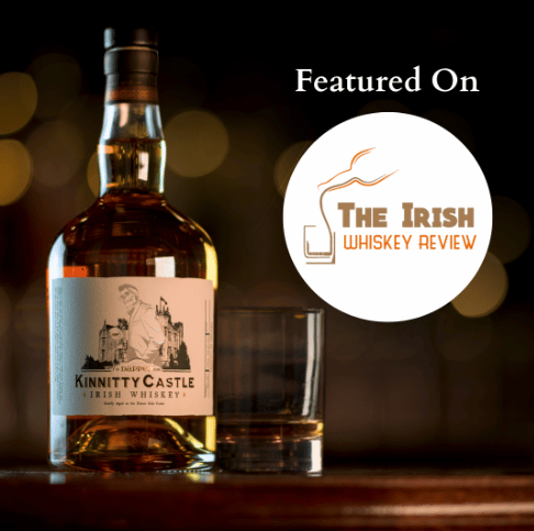 kinnitty castle spirits featured on the irish whiskey review with dapper blend bottle and irish whiskey review podcast logo
