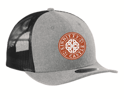 new era trucker hat in gray with kinnitty castle spirits stamp logo in rust side view